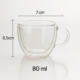 Cană din sticlă cu perete dublu, 80 ml, dimensiuni 7 cm lățime și 6,5 cm înălțime, transparentă, pe fundal alb.